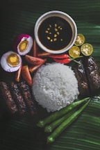 white rice, steamed okra, grilled eggplant, and salted egg