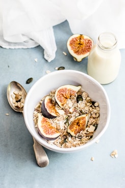 bottle of milk beside bowl
