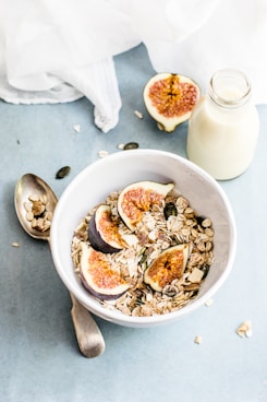 bottle of milk beside bowl