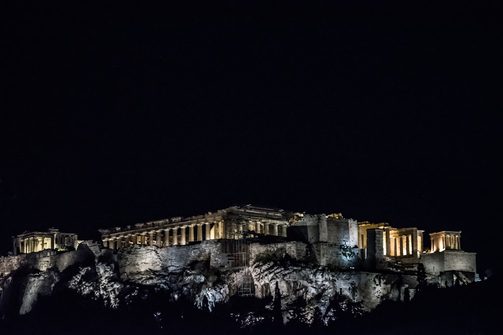 brown and gray concrete museum at nighttime