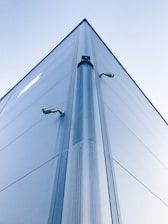 low-angle photo of building with security cameras