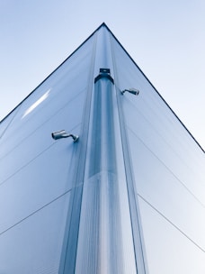 low-angle photo of building with security cameras