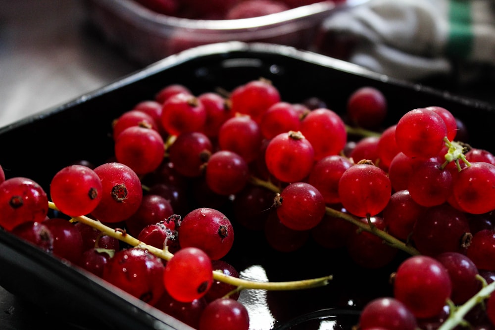 red berry on black plate