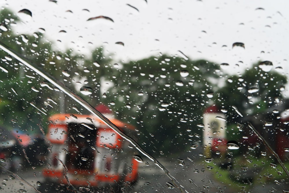 selective focus of vehicle window with water dew