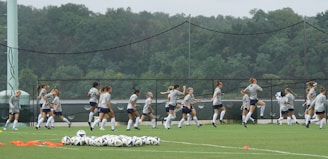 Behind-the-scenes moment of players warming up before a match.