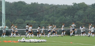Behind-the-scenes moment of players warming up before a match.