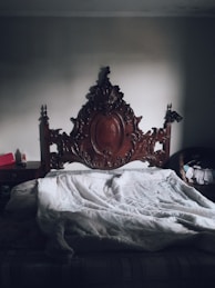 white blanket on bed