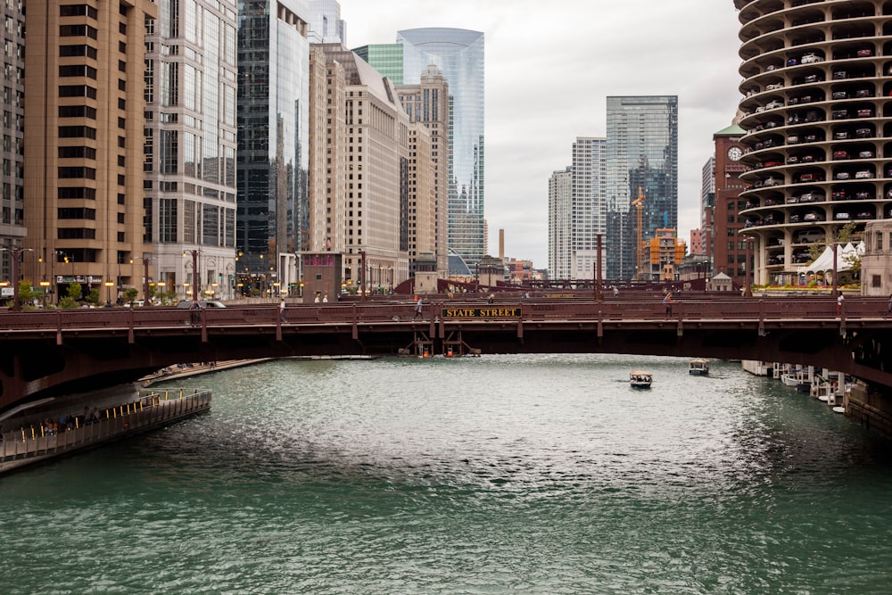 bridge over river near buildings