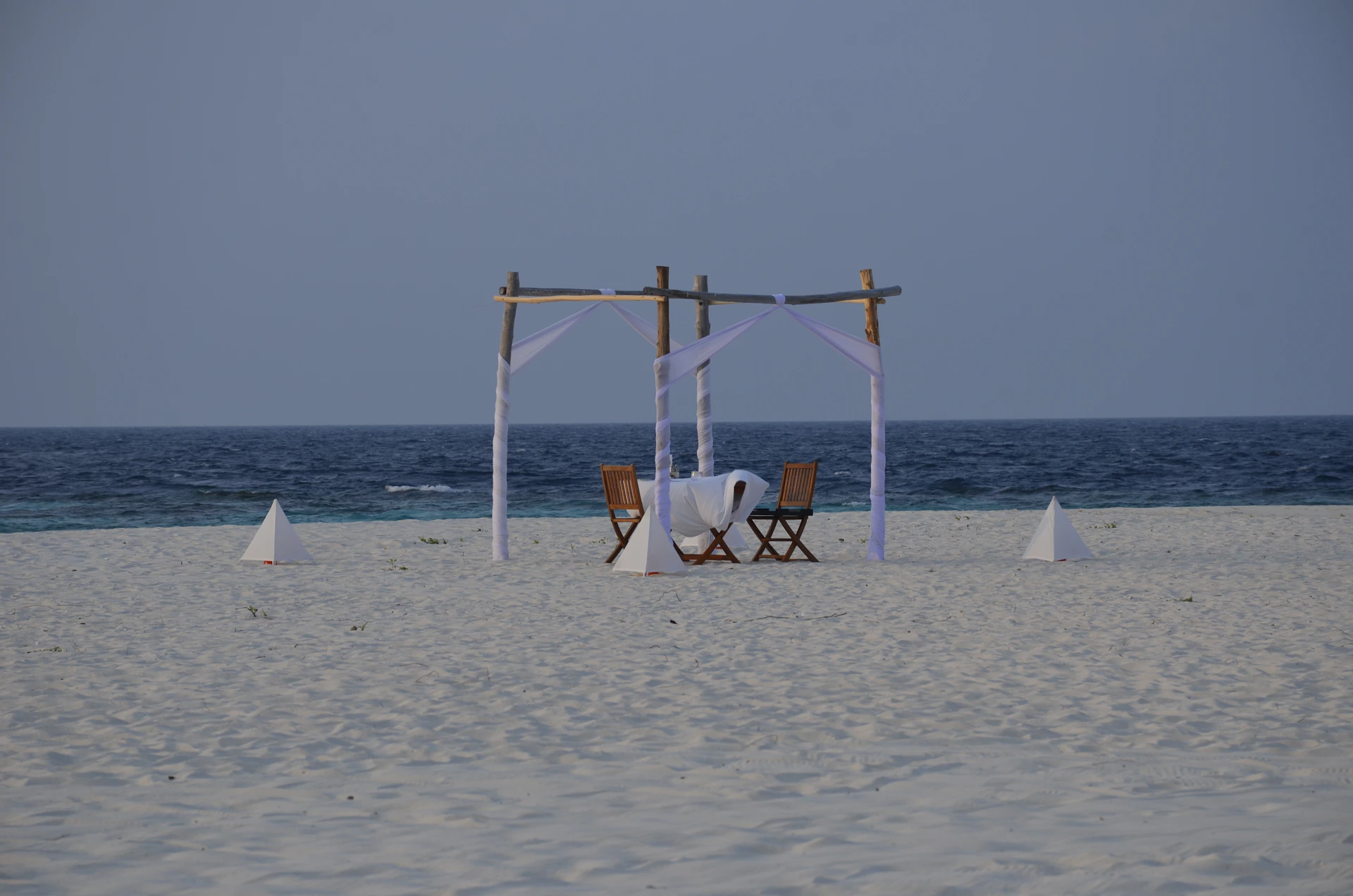 couple wearing silver-colored rings