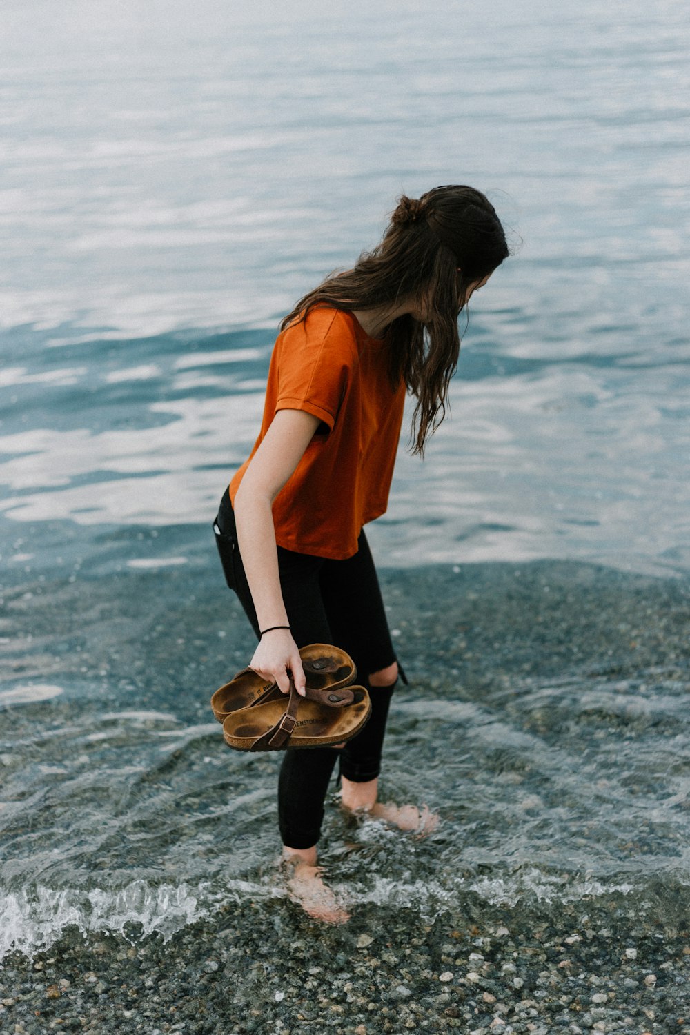 women's orange scoop-neck shirt