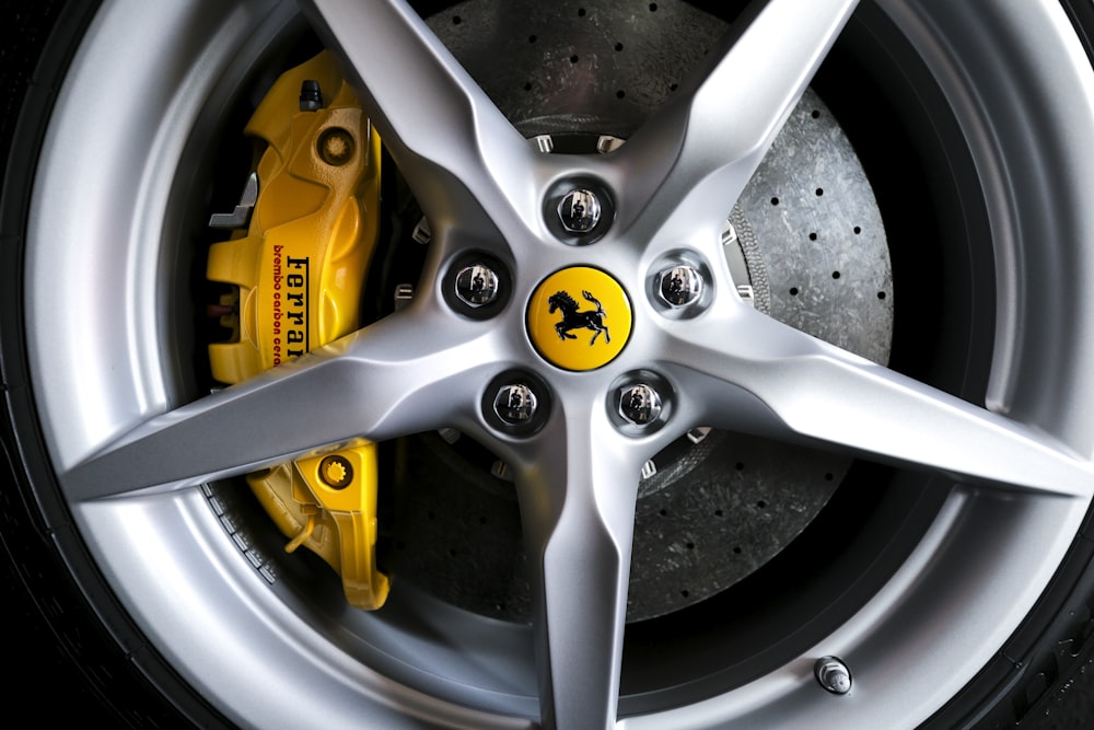 gray Ferrari 5-spoke wheel