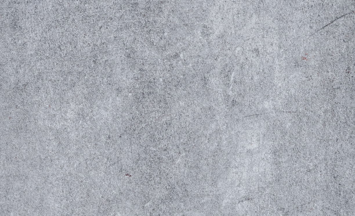 a close up of a gray concrete surface