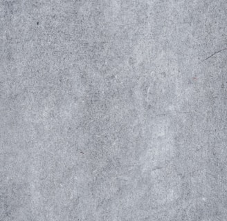 a close up of a gray concrete surface