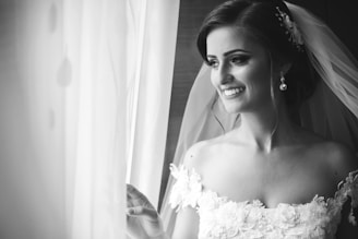 grayscale photo of woman in wedding gown