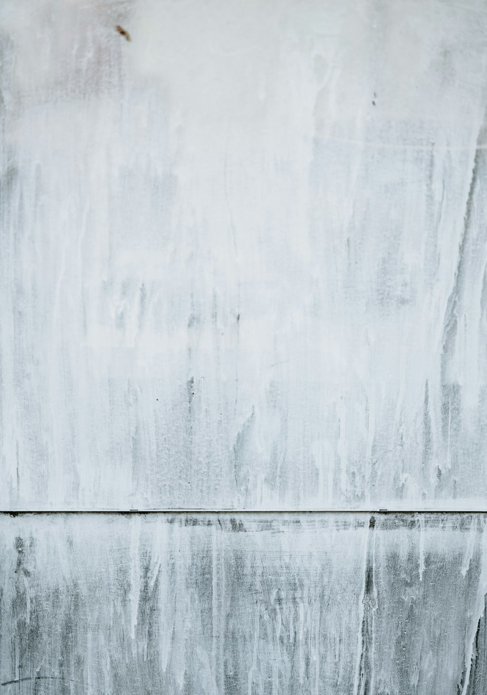 a black and white photo of a concrete wall