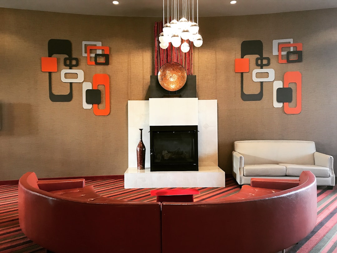red leather sofa with fire place,