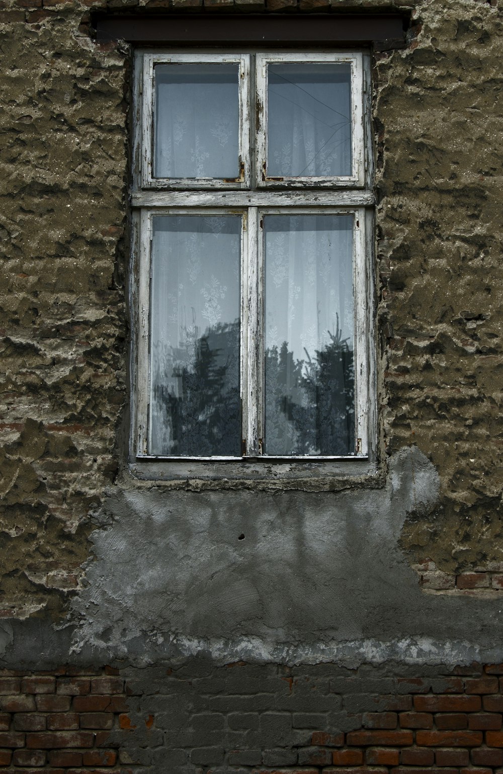 gray wooden framed window glass