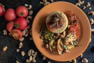 A vibrant Moroccan couscous dish with colorful vegetables and tender meat, beautifully plated.