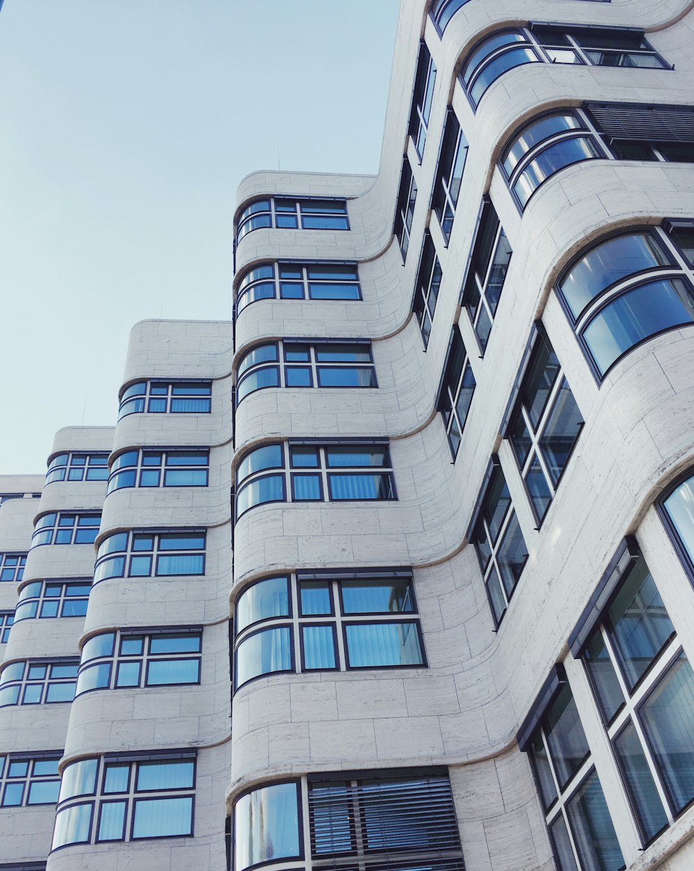 white concrete building under blue sky