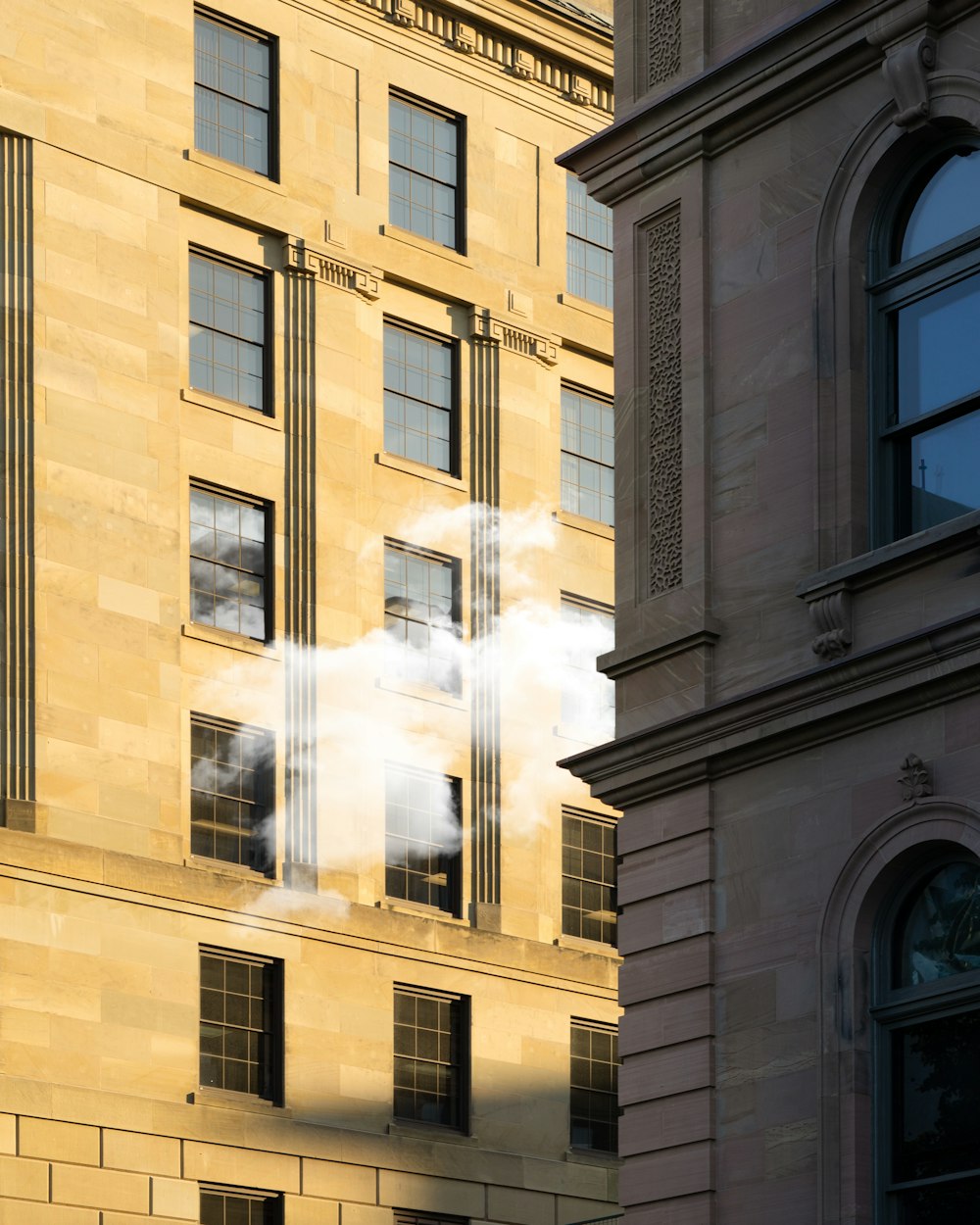 smoke coming from between buildings