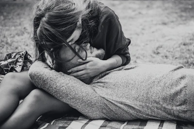 An intimate portrait of a couple enjoying a picnic.