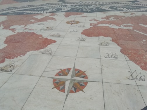 An old-style map illustrating a flat earth concept with detailed edges and oceans.