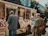Group of happy tourists boarding a bus in downtown Rio de Janeiro ready for a scheduled tour.
