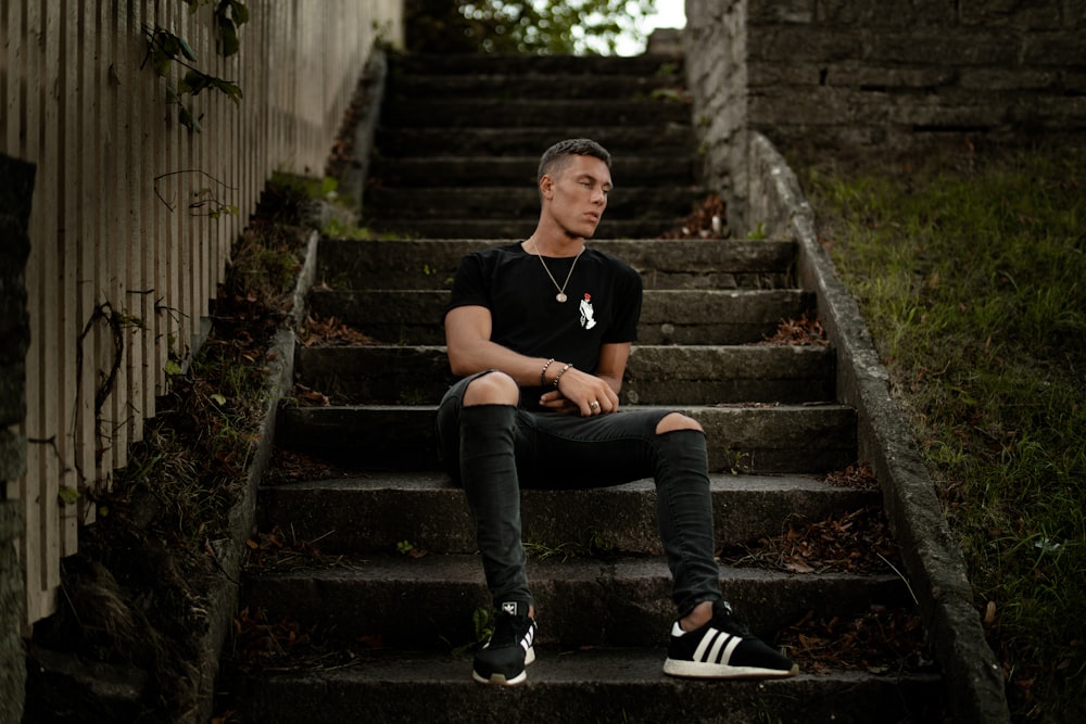 man sitting on the stair