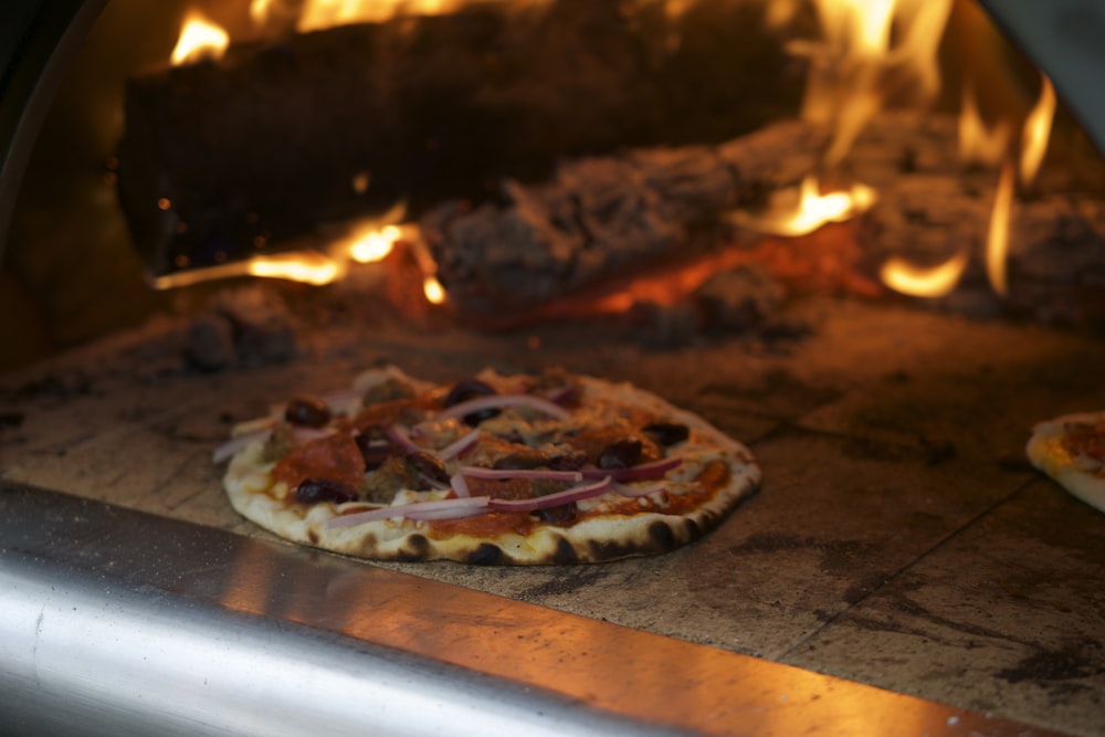 cooked pizza inside oven