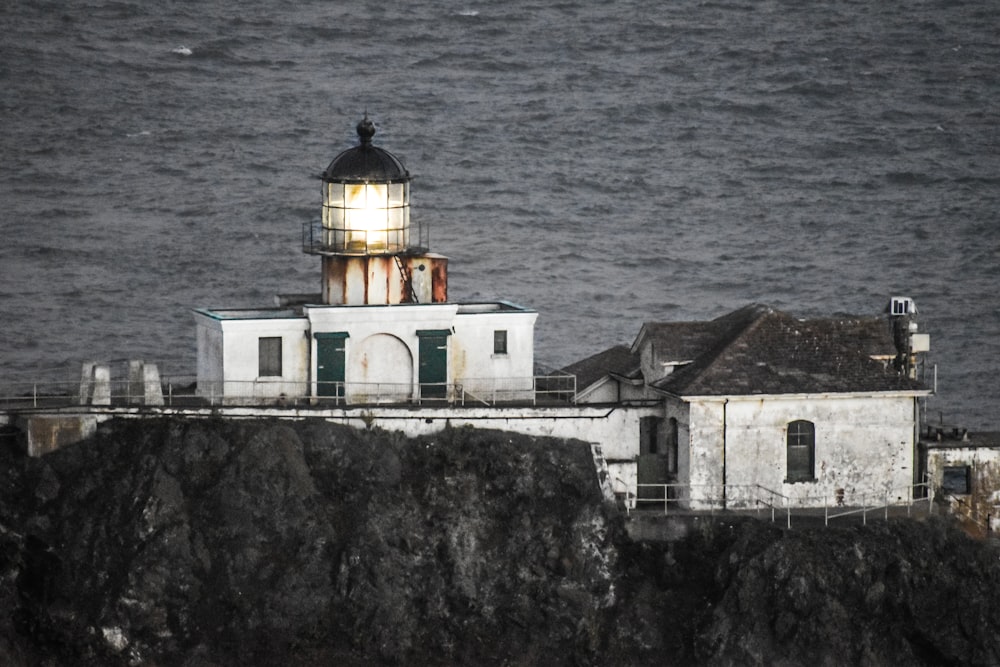 aerial photo of white concrete lighthouse