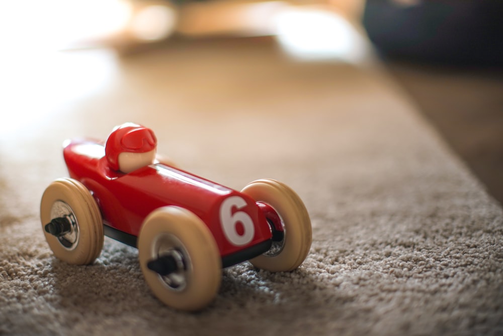 red and brown car toy