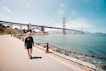 woman walking near Golden Gate Bridge
