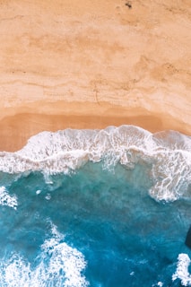sea waves on brown sand