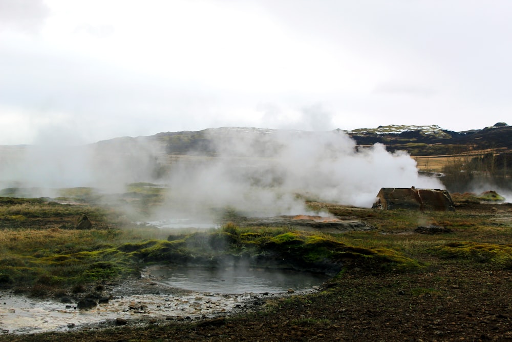 photo of land covered by smoke