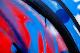 A large-scale commission artwork displayed in an urban East London setting, highlighting intricate brushwork.