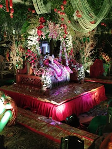 Elegant floral arrangement decorating a wedding altar.
