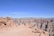 A happy tourist group enjoying a guided tour at the Edge of the World in Saudi Arabia.