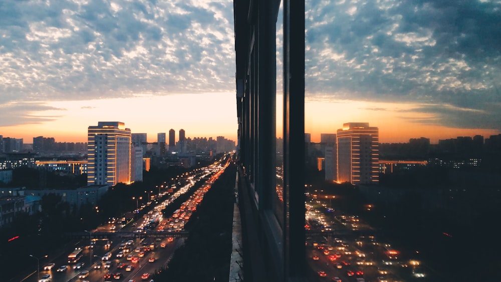 cars on road under blue sky