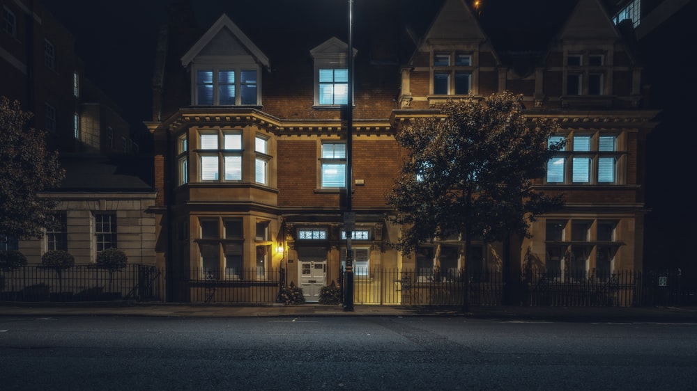 lighted house at night time