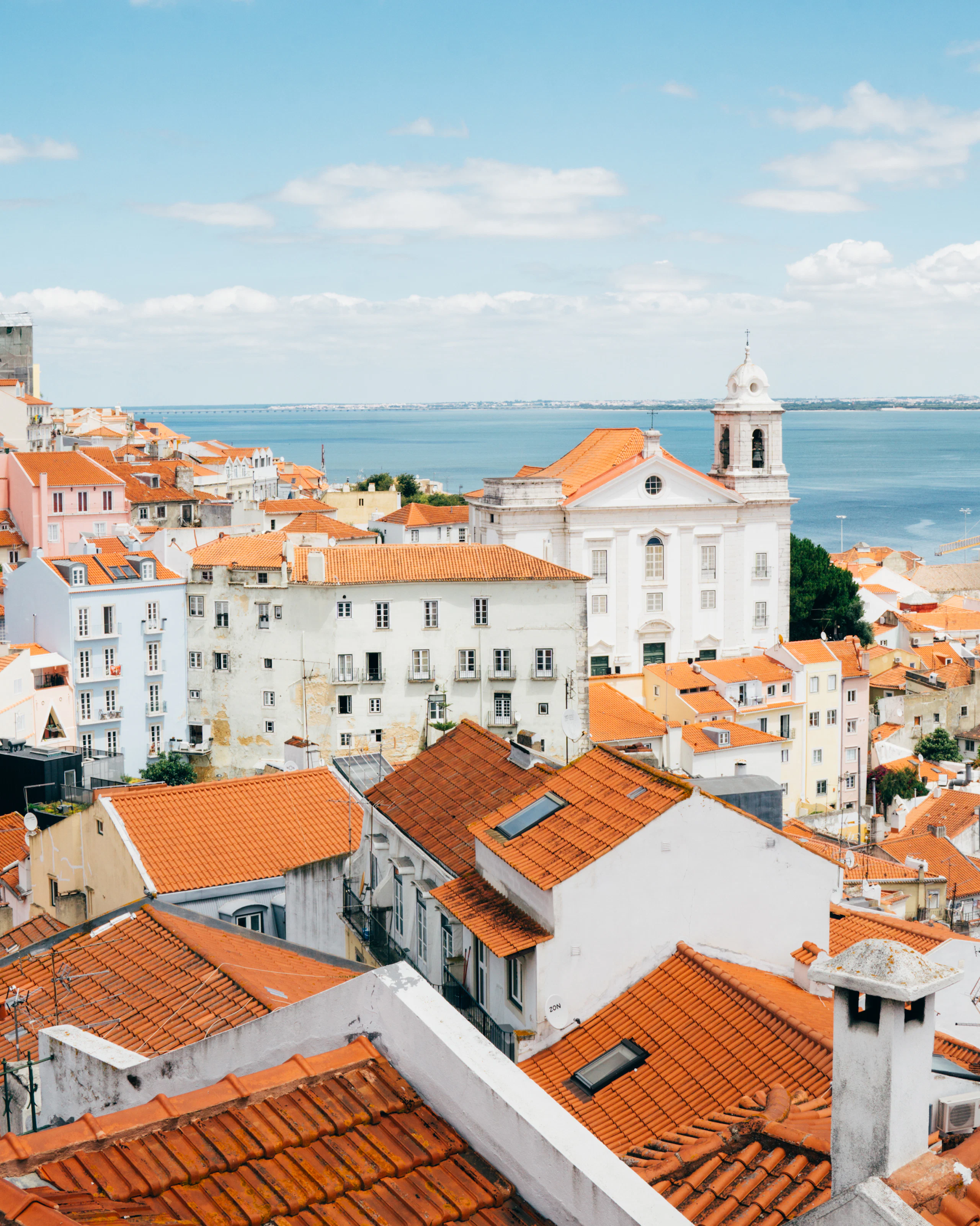 Lisbon rooftops stepping down towards the Tagus