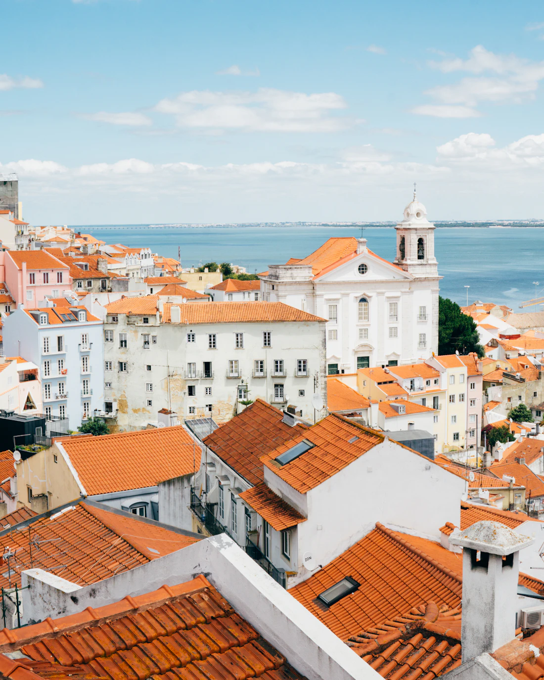 Lisbon rooftops and river view