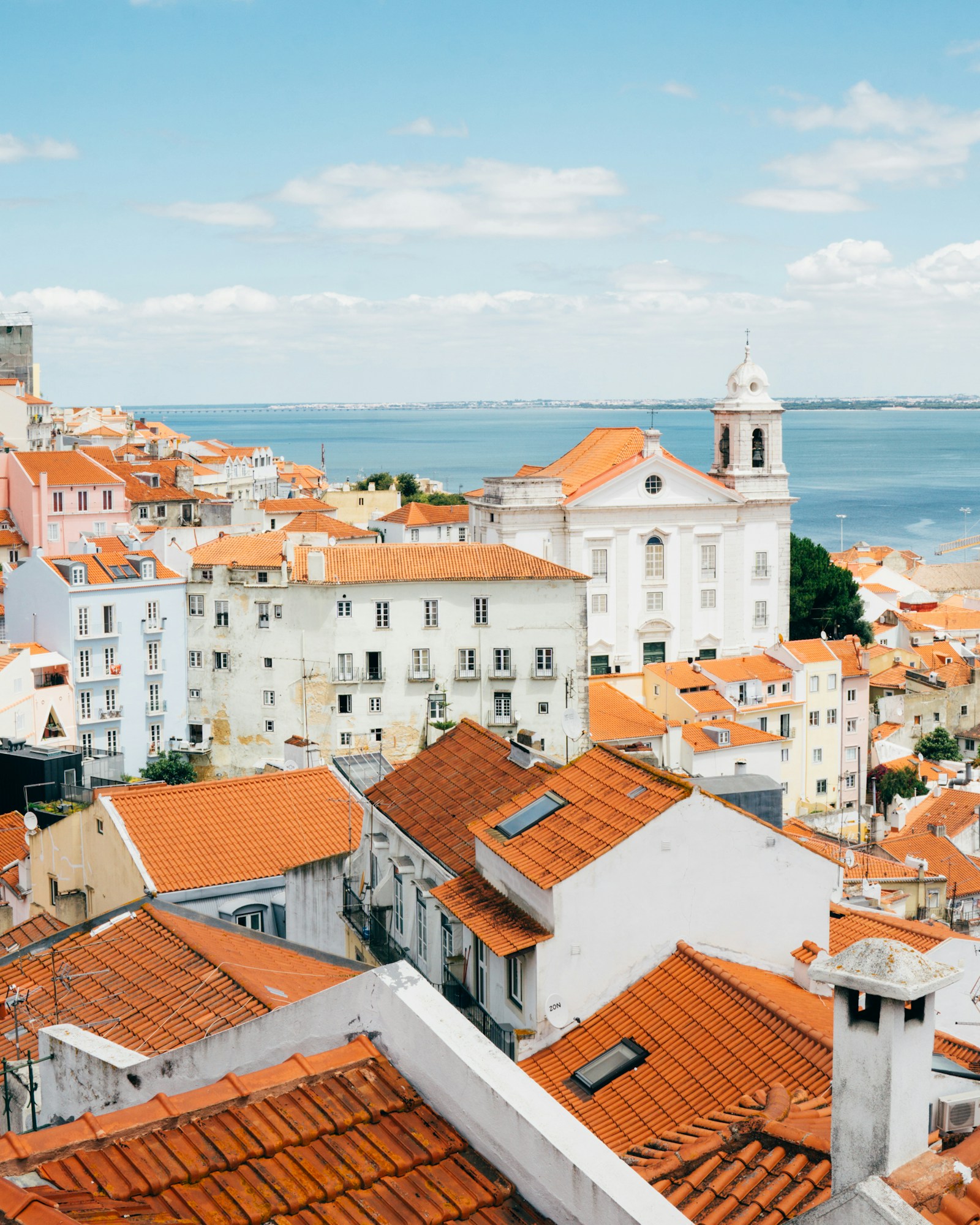 Lisbon rooftops and the Tagus River in Portugal