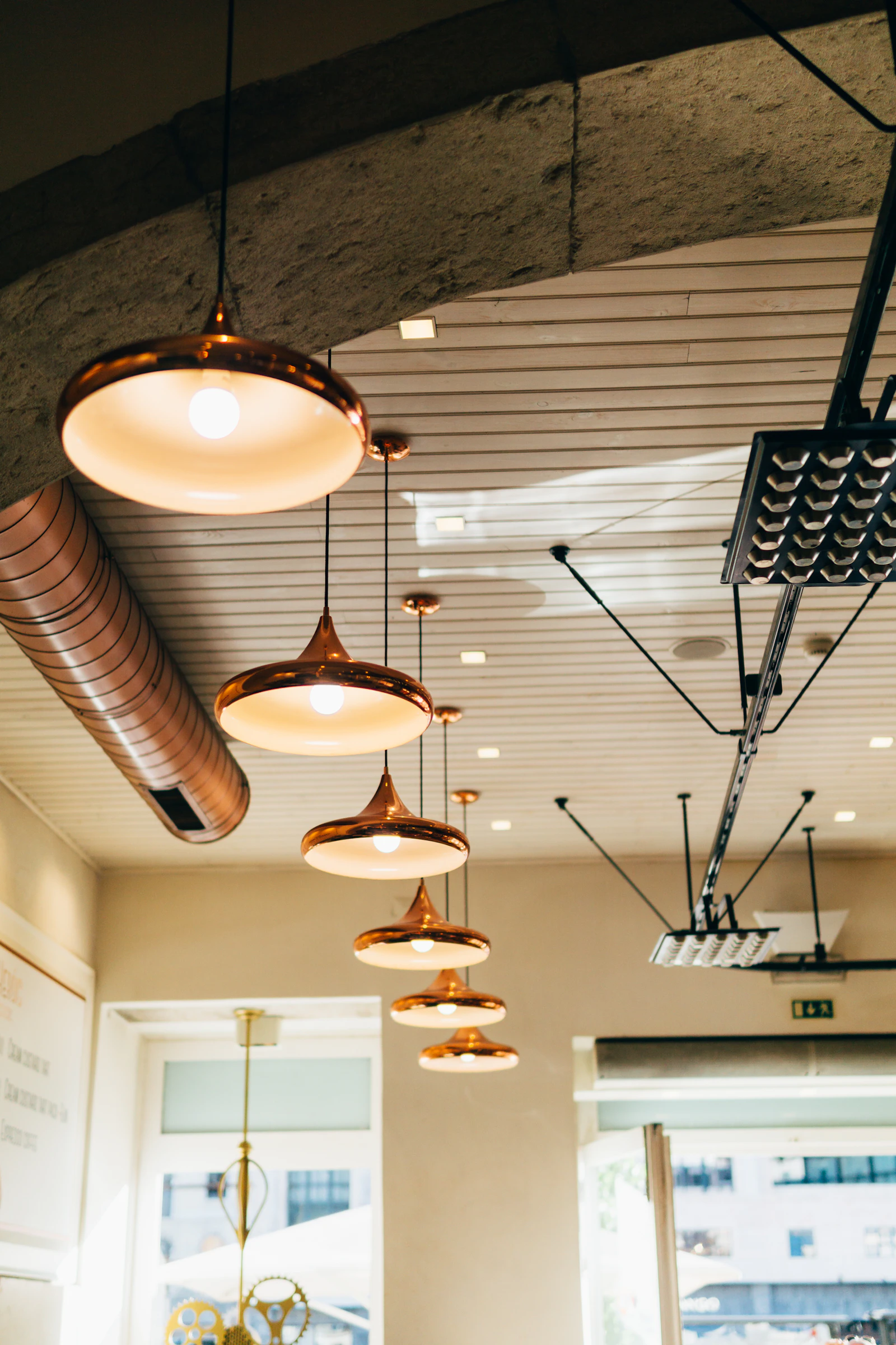 Bright shop interior with modern pendant lighting