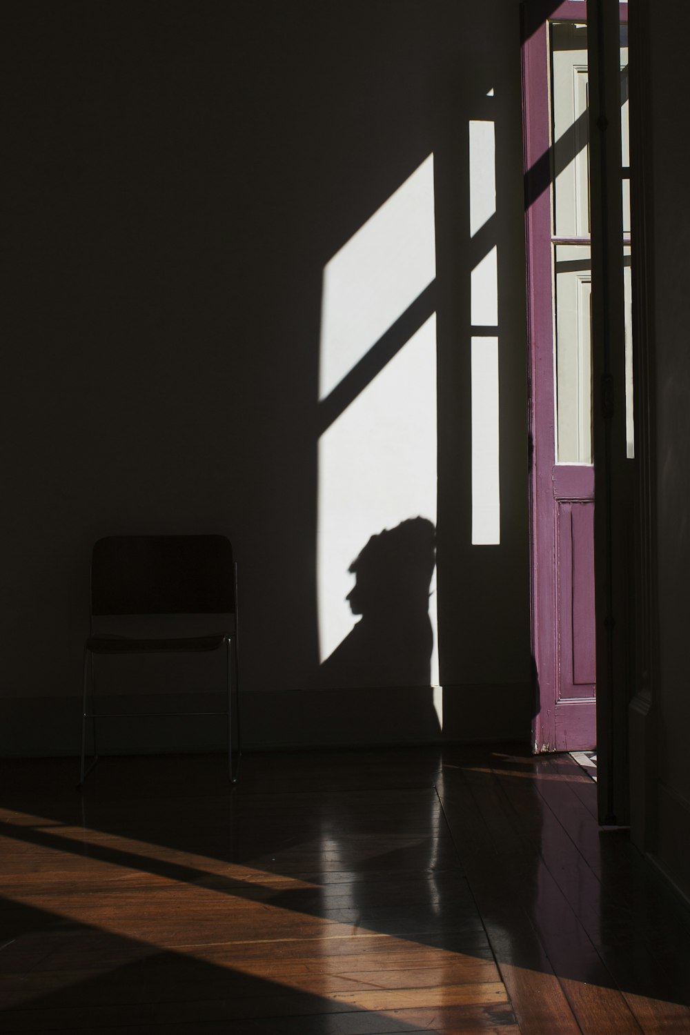 silhouette of person on wall
