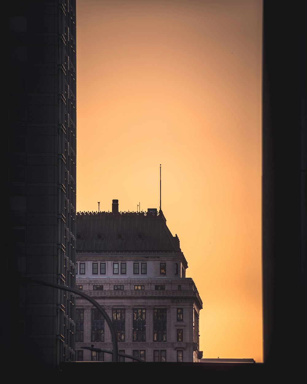 long exposure photography of white and black concrete building during golden hour