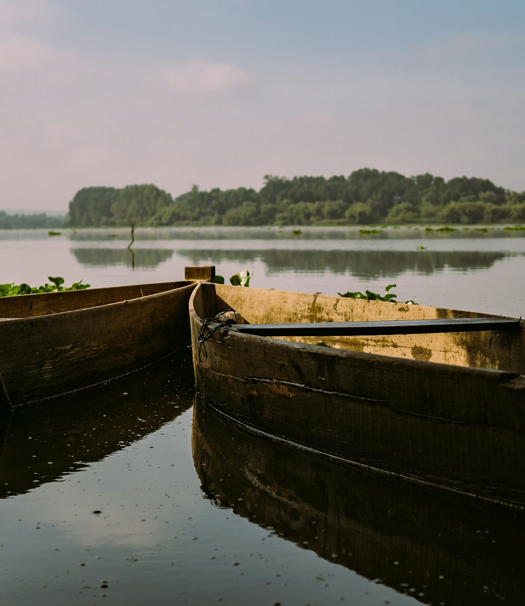 brown boat on body of water