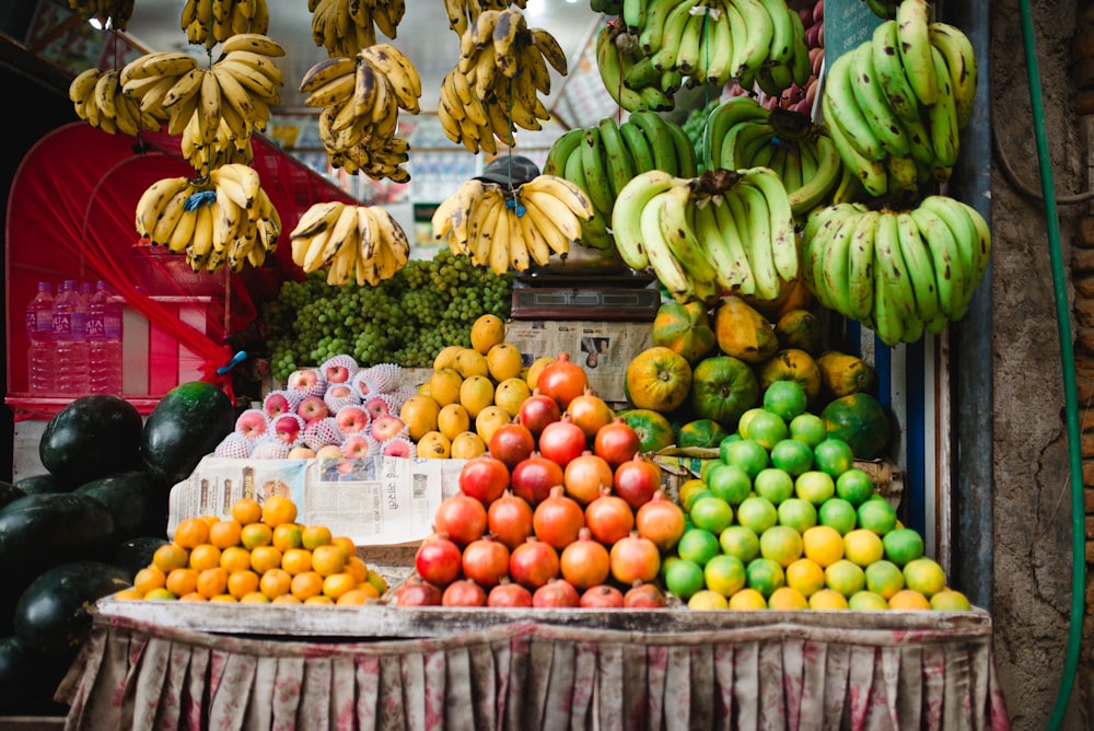assorted fruits display on rack