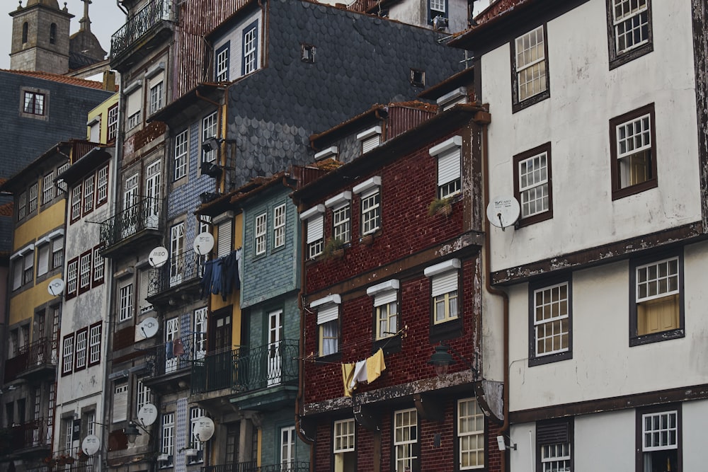 red and white concrete buildings at daytime