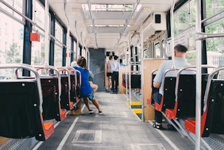 people riding the bus at daytime