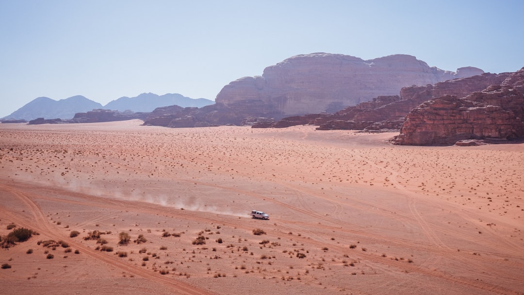 white SUV, Jeep in canyon